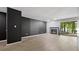 Open-concept living room featuring new floors, a fireplace, and a sliding glass door at 47 Arbor End, Smyrna, GA 30080