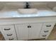 Bathroom featuring a stylish white vanity with a modern countertop and sleek black hardware at 1968 Rosewood Rd, Decatur, GA 30032