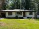 Charming single-story home with a well-maintained lawn and inviting curb appeal at 1968 Rosewood Rd, Decatur, GA 30032