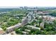 Aerial view of city skyline nestled among lush greenery, featuring residential buildings at 2260 Peachtree Nw Rd # B4, Atlanta, GA 30309