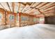 Unfinished basement with insulation, windows, and exposed framing at 2883 Thurleston Ln, Duluth, GA 30097