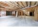 Unfinished basement with exposed HVAC, plumbing, and framing at 2883 Thurleston Ln, Duluth, GA 30097