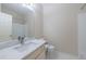 This bathroom features a vanity with marble countertops and large mirror, and white subway tile shower at 2883 Thurleston Ln, Duluth, GA 30097
