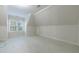 Neutral bedroom with a large window and plush carpet provides a tranquil space at 2883 Thurleston Ln, Duluth, GA 30097