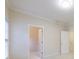 Neutral bedroom featuring carpeted floor, trim, window, and two closets at 2883 Thurleston Ln, Duluth, GA 30097