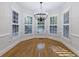 Sun-filled breakfast nook featuring hardwood floors and large windows at 2883 Thurleston Ln, Duluth, GA 30097