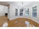 Sun-filled breakfast nook featuring hardwood floors and large windows at 2883 Thurleston Ln, Duluth, GA 30097