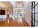 Spacious foyer features hardwood floors, high ceilings, columns, and natural light at 2883 Thurleston Ln, Duluth, GA 30097