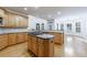 Spacious kitchen features hardwood floors, stainless steel appliances, and granite countertops at 2883 Thurleston Ln, Duluth, GA 30097