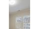 The large window provides natural light and a great view of the surrounding nature at 2883 Thurleston Ln, Duluth, GA 30097