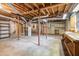 Spacious unfinished basement with exposed ceiling, concrete floor, and utilitarian setup at 3390 Kenland Se Rd, Smyrna, GA 30082