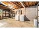 Unfinished basement area with laundry appliances, open ceiling, and concrete flooring at 3390 Kenland Se Rd, Smyrna, GA 30082