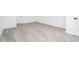 Clean, carpeted basement space with neutral decor, featuring white walls and trim at 3390 Kenland Se Rd, Smyrna, GA 30082