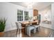Cozy dining area with a modern table set and natural light at 3390 Kenland Se Rd, Smyrna, GA 30082