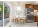 Bright eat-in kitchen with stainless steel appliances, and views of the deck at 3390 Kenland Se Rd, Smyrna, GA 30082