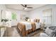 Comfortable main bedroom with a ceiling fan and a door to the backyard at 3390 Kenland Se Rd, Smyrna, GA 30082