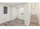 Spacious basement storage area with stairs and washer dryer hookups at 4030 Tanglewood Rd, Snellville, GA 30039