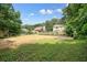 Expansive backyard offering privacy and possibilities for outdoor activities and relaxation at 6223 Emerald Springs Se Dr, Acworth, GA 30102