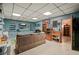 Finished basement with tan sofa and display shelving at 6223 Emerald Springs Se Dr, Acworth, GA 30102