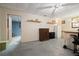 Finished basement room with furniture, shelving, and decor at 6223 Emerald Springs Se Dr, Acworth, GA 30102