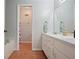 Bathroom featuring double sinks, a vanity, and tub/shower combo at 6223 Emerald Springs Se Dr, Acworth, GA 30102