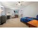 Spacious bedroom featuring a bed, desk, shelves, and ample space for activities at 6223 Emerald Springs Se Dr, Acworth, GA 30102