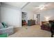 Large bedroom with bed, dresser, closet and sitting area at 6223 Emerald Springs Se Dr, Acworth, GA 30102