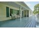View of porch showing ample room with rocking chairs for relaxing and enjoying outdoors at 6223 Emerald Springs Se Dr, Acworth, GA 30102