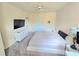 Bright main bedroom with a plush carpet and white furniture at 1975 Nocturne Dr # 2206, Alpharetta, GA 30009
