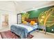 The bedroom has a leaf paint mural with a bed, rug, and vaulted ceiling at 380 Victorian Ln, Duluth, GA 30097