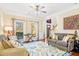 Inviting living room features hardwood floors, neutral walls, comfortable sofas, and stylish decor at 380 Victorian Ln, Duluth, GA 30097