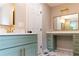 Contemporary bathroom featuring modern vanity, stylish mirror and great natural light at 45 Driskell Ave, Mableton, GA 30126