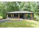 Charming single-story home with a gray exterior, freshly cut lawn, and a welcoming front entrance at 45 Driskell Ave, Mableton, GA 30126