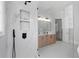 Bright bathroom featuring a walk-in shower with marble tiling, a vanity, and modern fixtures at 4559 Paradise Shoals Se Rd, Atlanta, GA 30339