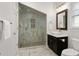 A modern bathroom featuring a glass-enclosed shower, vessel sink, and stylish fixtures at 4559 Paradise Shoals Se Rd, Atlanta, GA 30339