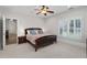 A stylish bedroom with plantation shutters and hardwood floors, providing a peaceful retreat at 4559 Paradise Shoals Se Rd, Atlanta, GA 30339