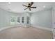 Spacious bedroom with bay window and neutral carpet at 4559 Paradise Shoals Se Rd, Atlanta, GA 30339