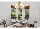 Bright dining area featuring seating for four, and large bright windows at 4559 Paradise Shoals Se Rd, Atlanta, GA 30339