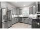 An immaculate kitchen with stainless steel appliances, ample cabinet space, and sleek countertops at 4559 Paradise Shoals Se Rd, Atlanta, GA 30339
