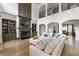 Beautifully designed living room with fireplace, custom cabinetry, and a soaring ceiling at 4559 Paradise Shoals Se Rd, Atlanta, GA 30339