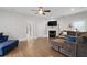 A bright living room with a fireplace and hardwood floors, perfect for relaxing and entertaining at 4559 Paradise Shoals Se Rd, Atlanta, GA 30339
