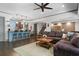 Spacious living room with an open floor plan, barstool seating, and comfortable seating at 4559 Paradise Shoals Se Rd, Atlanta, GA 30339