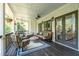 Cozy outdoor porch with comfortable seating and stylish decor at 4559 Paradise Shoals Se Rd, Atlanta, GA 30339