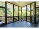 Bright sunroom with dark trim and natural light at 4559 Paradise Shoals Se Rd, Atlanta, GA 30339
