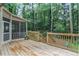 Back deck overlooking a private, wooded backyard with stairs leading to lower level at 4810 Lismoor Trce, Mableton, GA 30126