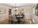 Elegant dining room perfect for entertaining with neutral colors and ample light at 4810 Lismoor Trce, Mableton, GA 30126