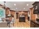 Spacious kitchen with hardwood floors, center island and ample storage space at 4810 Lismoor Trce, Mableton, GA 30126