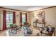 Cozy living room with hardwood floors, natural light and stylish decor at 4810 Lismoor Trce, Mableton, GA 30126