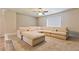 Spacious bonus room with plush carpeting, recessed lighting, and a comfortable sectional sofa at 5381 Front Runner Ct, Sugar Hill, GA 30518