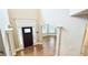Grand foyer with soaring ceilings, dark wood floors, and an arched doorway at 5381 Front Runner Ct, Sugar Hill, GA 30518